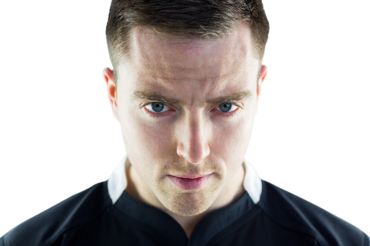 A rugby player looking down - Powered by Adobe