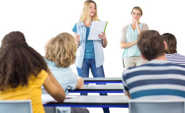 Student explaining notes besides teacher in class