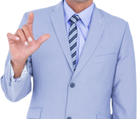 Midsection of businessman touching invisible screen