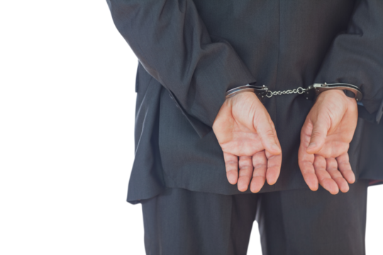 Businessman in handcuffs