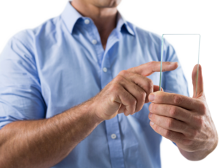 Male executive using glass mobile phone against white background