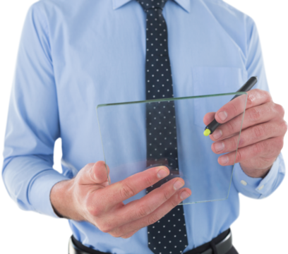 Mid section of businessman writing on glass interface