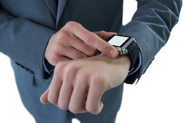 Midsection of businessman checking his smart watch