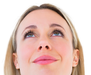 Close up of smiling blonde woman looking up