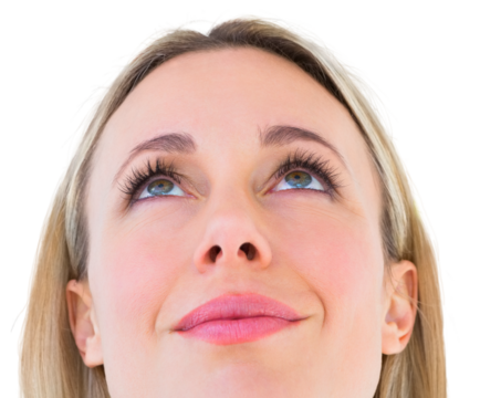 Close up of smiling blonde woman looking up