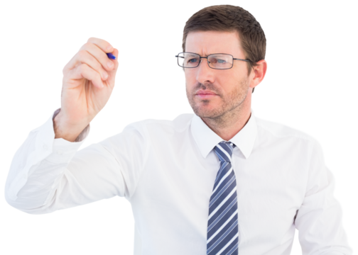 Businessman writing with a marker
