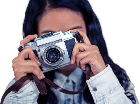 Asian woman taking picture with digital camera