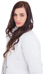 Obraz premium Beauty brown hair in white coat posing 