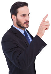 Focused businessman pointing in suit jacket