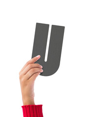 Person holding gray U sign