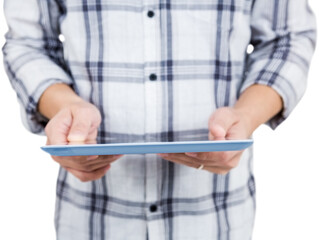Casual man using tablet pc