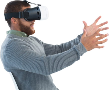Male executive using virtual reality headset