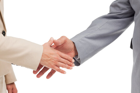 Close up of business people shaking their hands