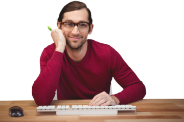 Portrait of confident man sitting at desk