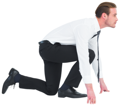 Businessman with hands and one knee on the floor