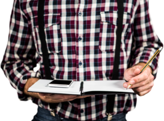 Hipster man writing on notebook