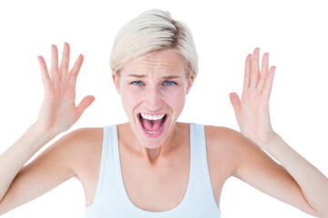 Angry blonde screaming with hands up 