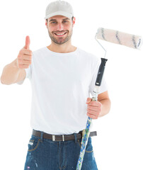 Happy man with paint roller gesturing thumbs up