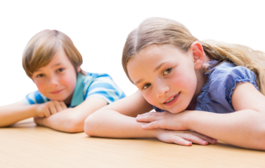 Cute pupils resting on their arms