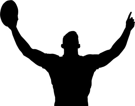 Male rugby player arms raised holding ball