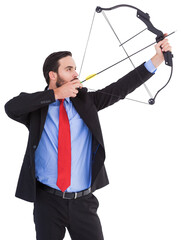 Focused businessman shooting a bow and arrow