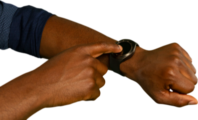 Mid-section of man using smartwatch