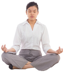 Businesswoman sitting in lotus pose