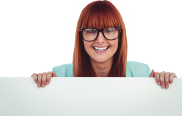 Smiling hipster woman behind a white card