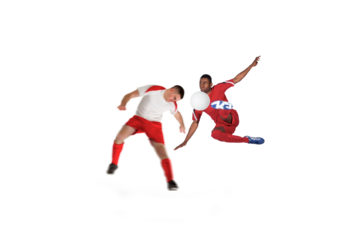 Football players tackling for the ball