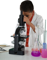 Schoolboy examing through microscope