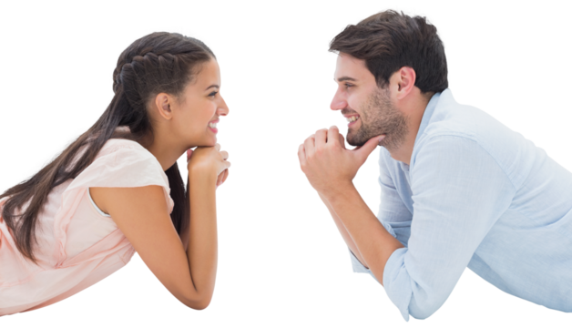 Attractive young couple smiling at each other