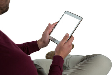 High angle view of man holding tablet computer