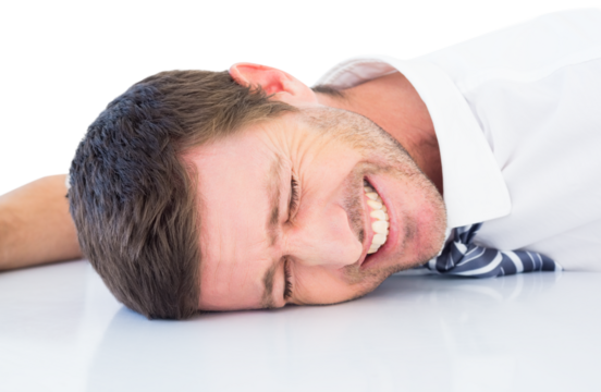 Stressed businessman banging his head