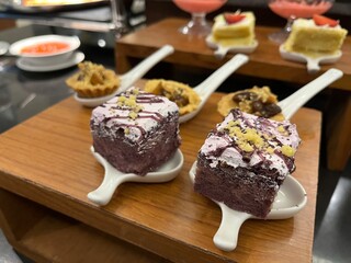 Catering service background with sliced cake on guests table in restaurant at event party.
