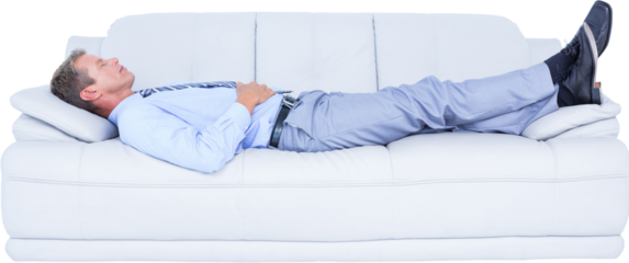 Businessman lying on sofa