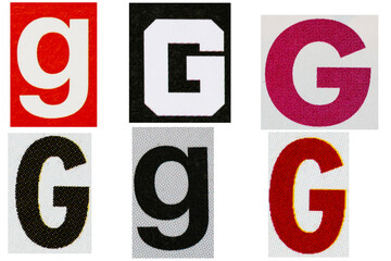 Letter font g from printout magazine cut out, collage element.
