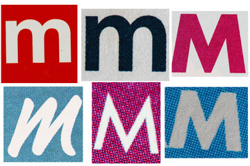 Letter font m from printout magazine cut out, collage element.