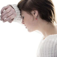 Sad pretty brunette leaning against wall
