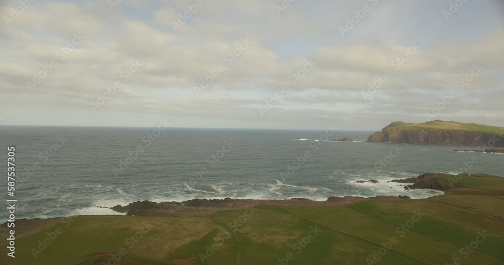 Poster Scenic view of cliffs by ocean