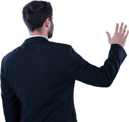 Businessman pretending to touch invisible screen