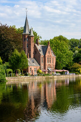 Fototapeta na wymiar Minnewater Lake and Castle, Bruges, Belgium