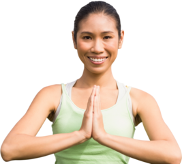 Smiling sporty woman doing yoga