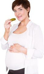 Portrait of happy pregnant woman eating pickle