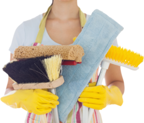 Woman holding brushes and mops