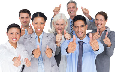 Happy business people with thumbs up looking at camera 