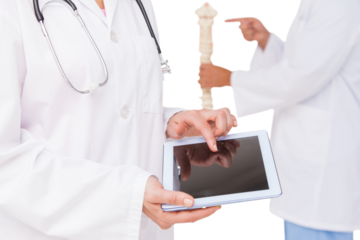 Doctor using tablet pc