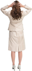 Businesswoman with hands on head standing back to camera