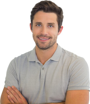 Smiling casual businessman with arms crossed in office