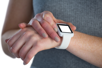 Close up of businesswoman adjusting smart watch