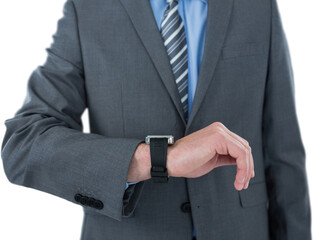 Businessman checking smart watch 